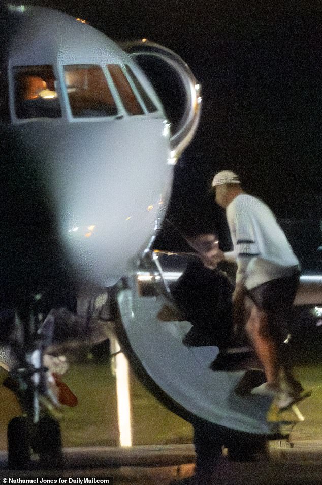 Kelce climbed the stairs to the Dassault Falcon jet – the same type as his girlfriend's - at midnight, giving him several hours before his expected appearance at the Kansas City Sports Awards