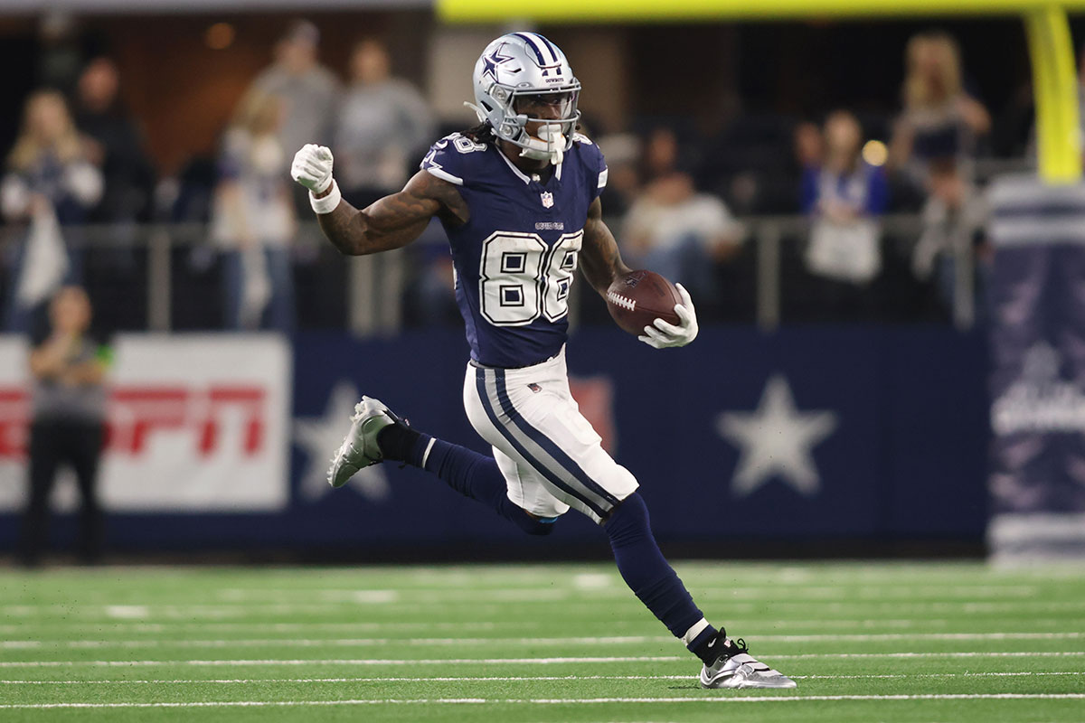 Dallas Cowboys wide receiver CeeDee Lamb (88) runs the ball in the second half against the Detroit Lions at AT&T Stadium.