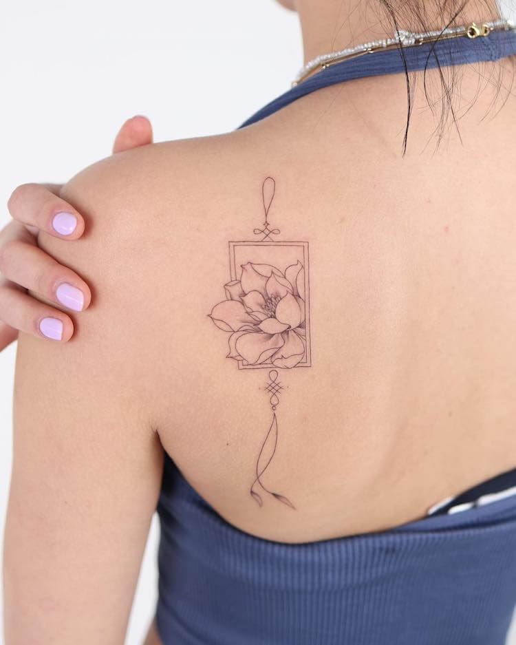 Small Floral Back Tattoo