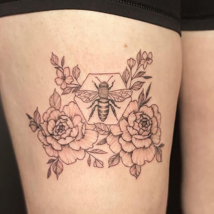 bee tattoo on thigh