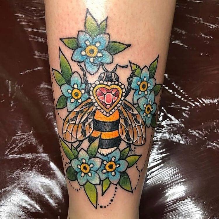 colorful bee tattoo with ruby