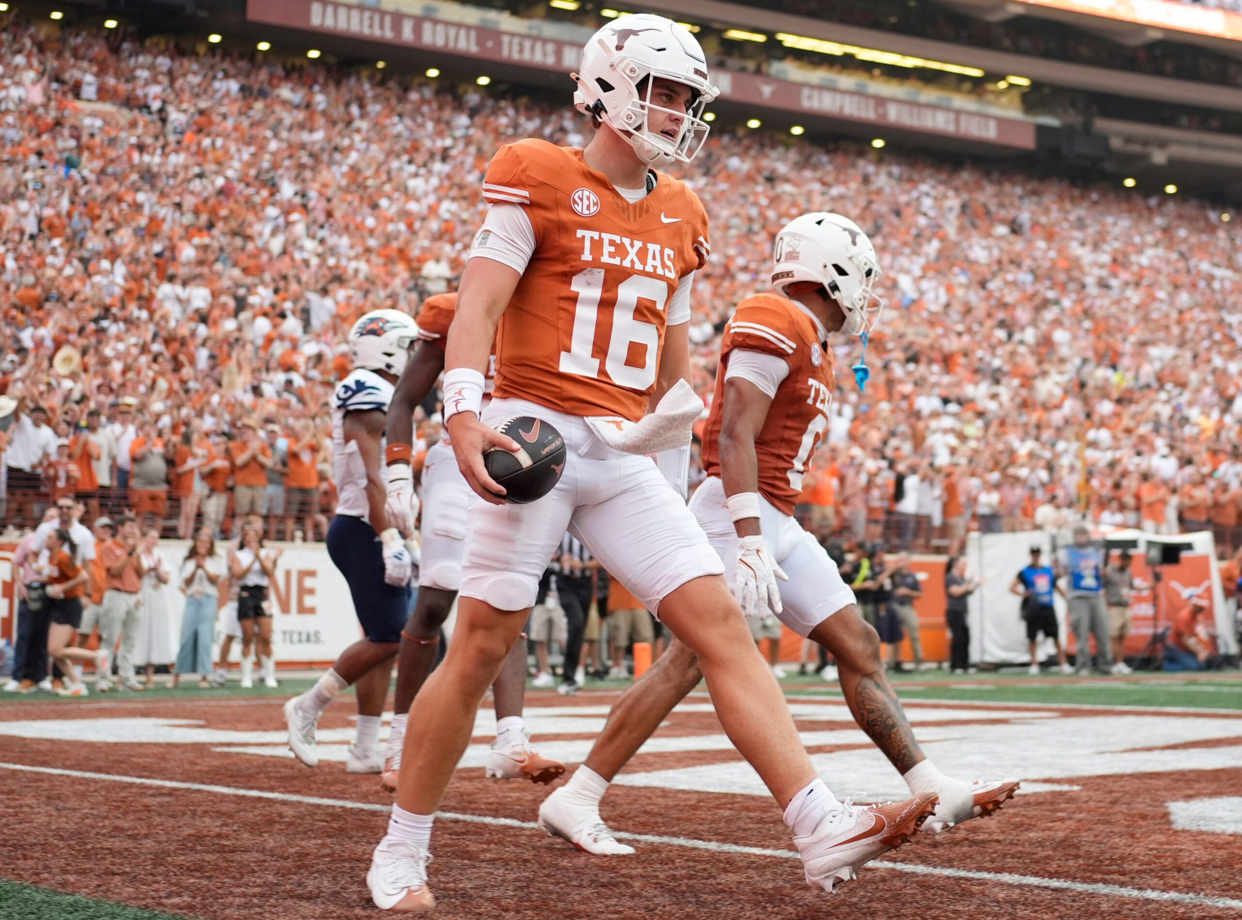 Texas quarterback Arch Manning (16) reacts after scoring a touchdown during the first half against Texas-San Antonio at Darrell K Royal-Texas Memorial Stadium.