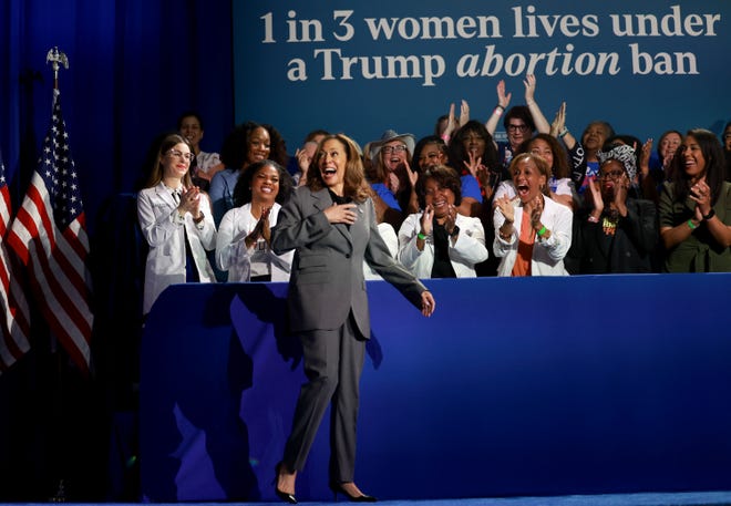 Democratic presidential nominee, U.S. Vice President Kamala Harris, arrives on stage to speak during an event at the Cobb Energy Performing Arts Centre on September 20, 2024, in Atlanta, Georgia.