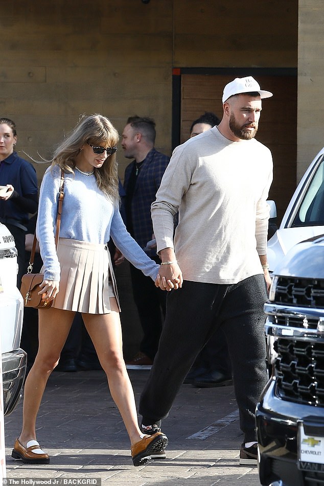 Swift and Kelce - pictured in March - are reunited during her tour hiatus at her famous Rhode Island mansion