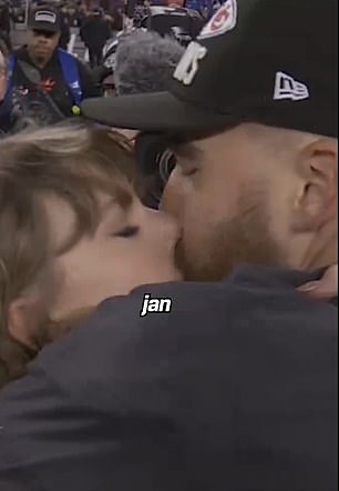 The NFL also included her kissing boyfriend Travis