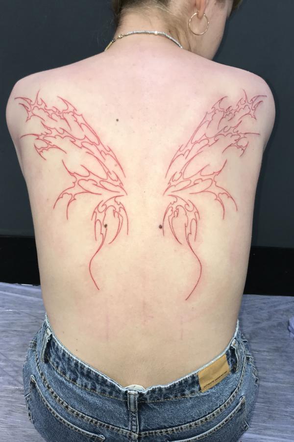 Back cyber sigilism angel wings tattoo