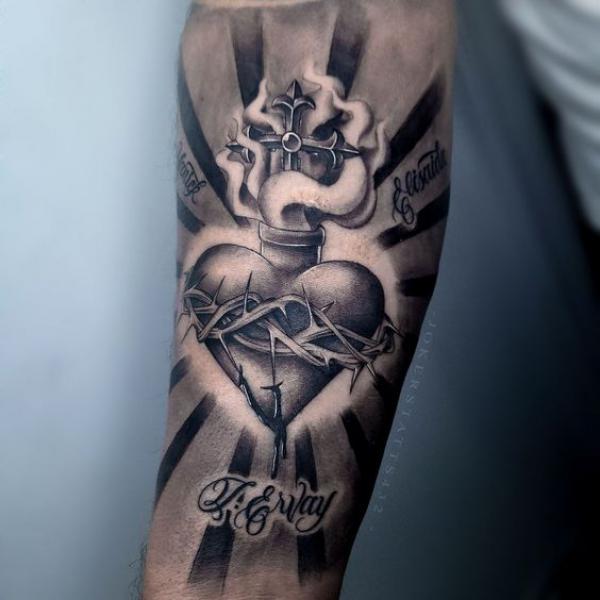 Black and white sacred heart with barbed wire and cross tattoo