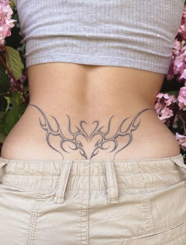 Double hearts cyber sigilism low back tattoo