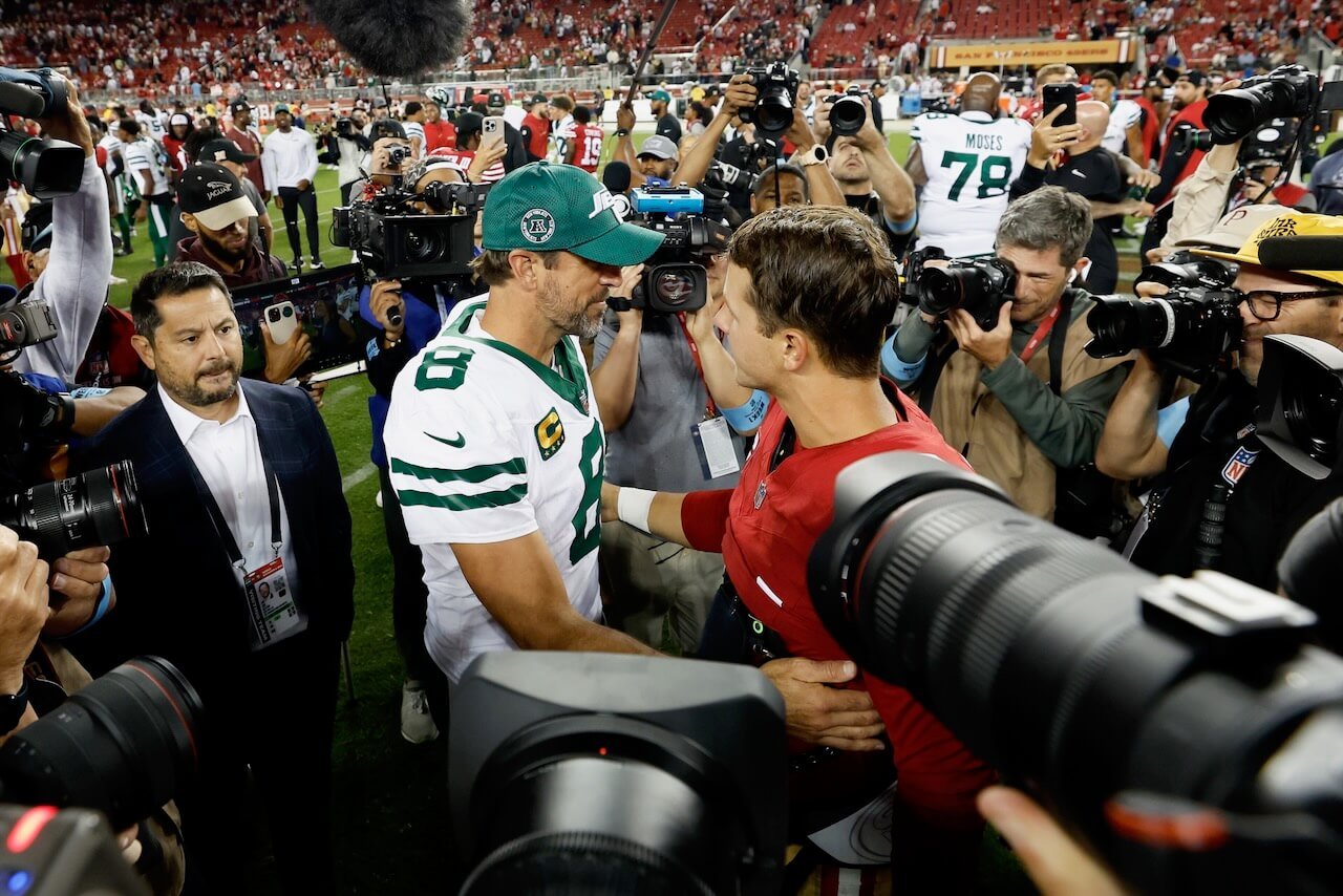 Aaron Rodgers and Brock Purdy