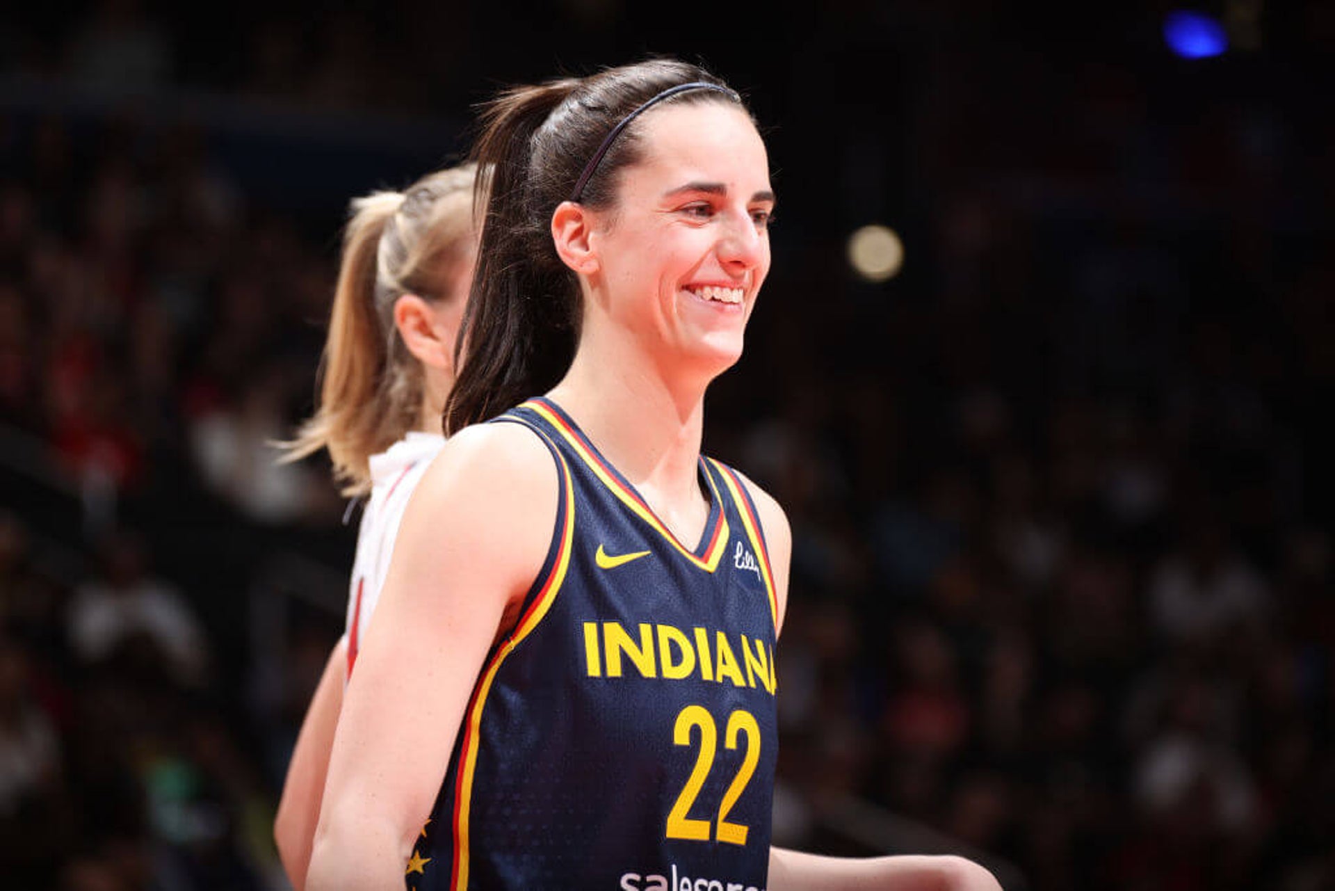 WASHINGTON, D.C. - SEPTEMBER 27: Caitlin Clark #22 of the Indiana Fever smiles during the game against the Washington Mystics on September 27, 2024 at Entertainment and Sports Arena in Washington, D.C. NOTE TO USER: User expressly acknowledges and agrees that, by downloading and or using this photograph, User is consenting to the terms and conditions of the Getty Images License Agreement. Mandatory Copyright Notice: Copyright 2024 NBAE (Photo by Stephen Gosling/NBAE via Getty Images)