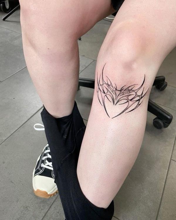 Heart cyber sigilism tattoo below the knee