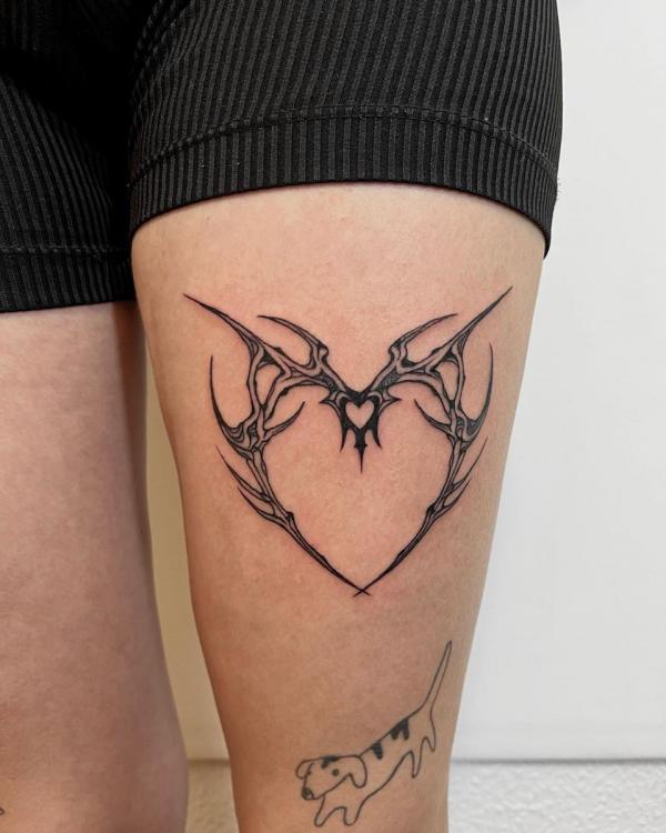 Heart cyber sigilism thigh tattoo