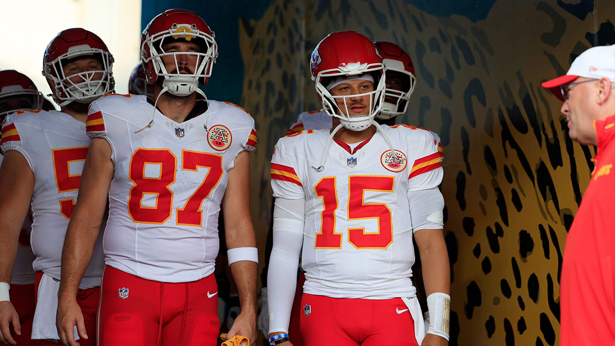 Kansas City Chiefs quarterback Patrick Mahomes (15) looks on next to tight end Travis Kelce (87) before a preseason NFL football game Saturday, Aug. 10, 2024 at EverBank Stadium in Jacksonville, Fla. The Jacksonville Jaguars defeated the Kansas City Chiefs 26-13.