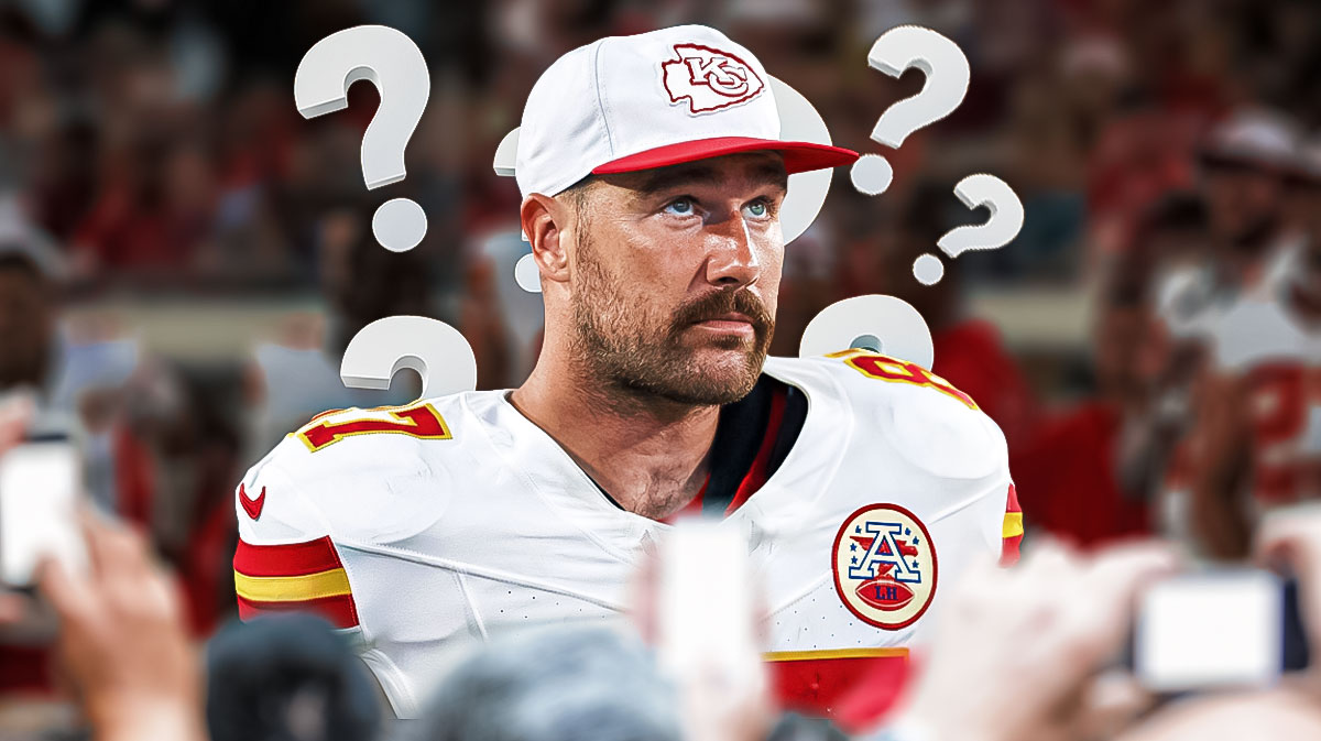 Travis Kelce looking up with question marks around