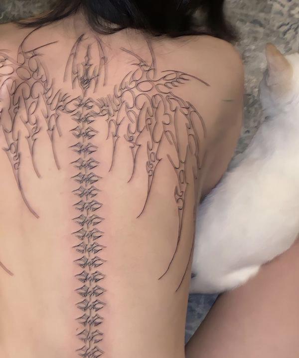 cyber sigilism angel wings tattoo back